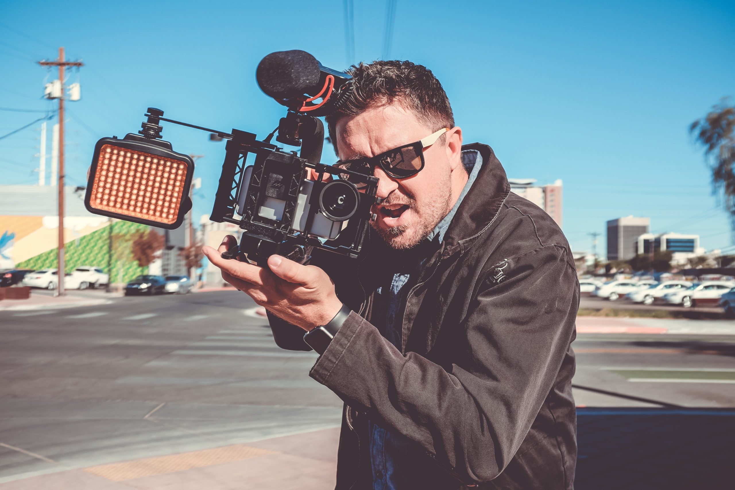 Kenny with a Film Camera on a street